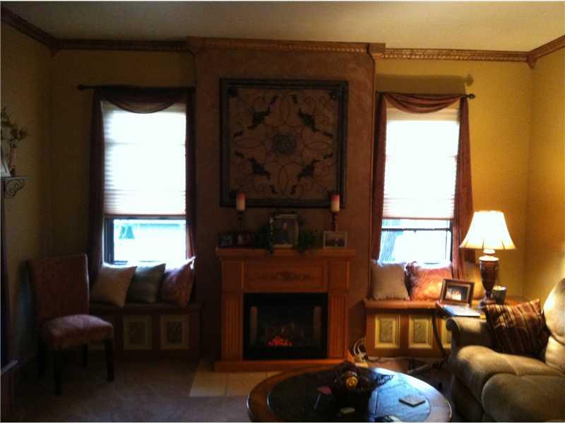 4 Highland Drive McKees Rocks, PA 15136 - Photo 9 of 19 Living Room. Look at that fireplace and crown molding!