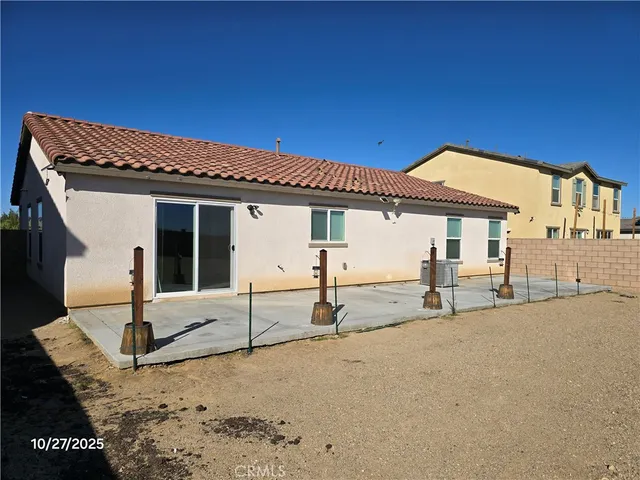 front view of a house with a patio