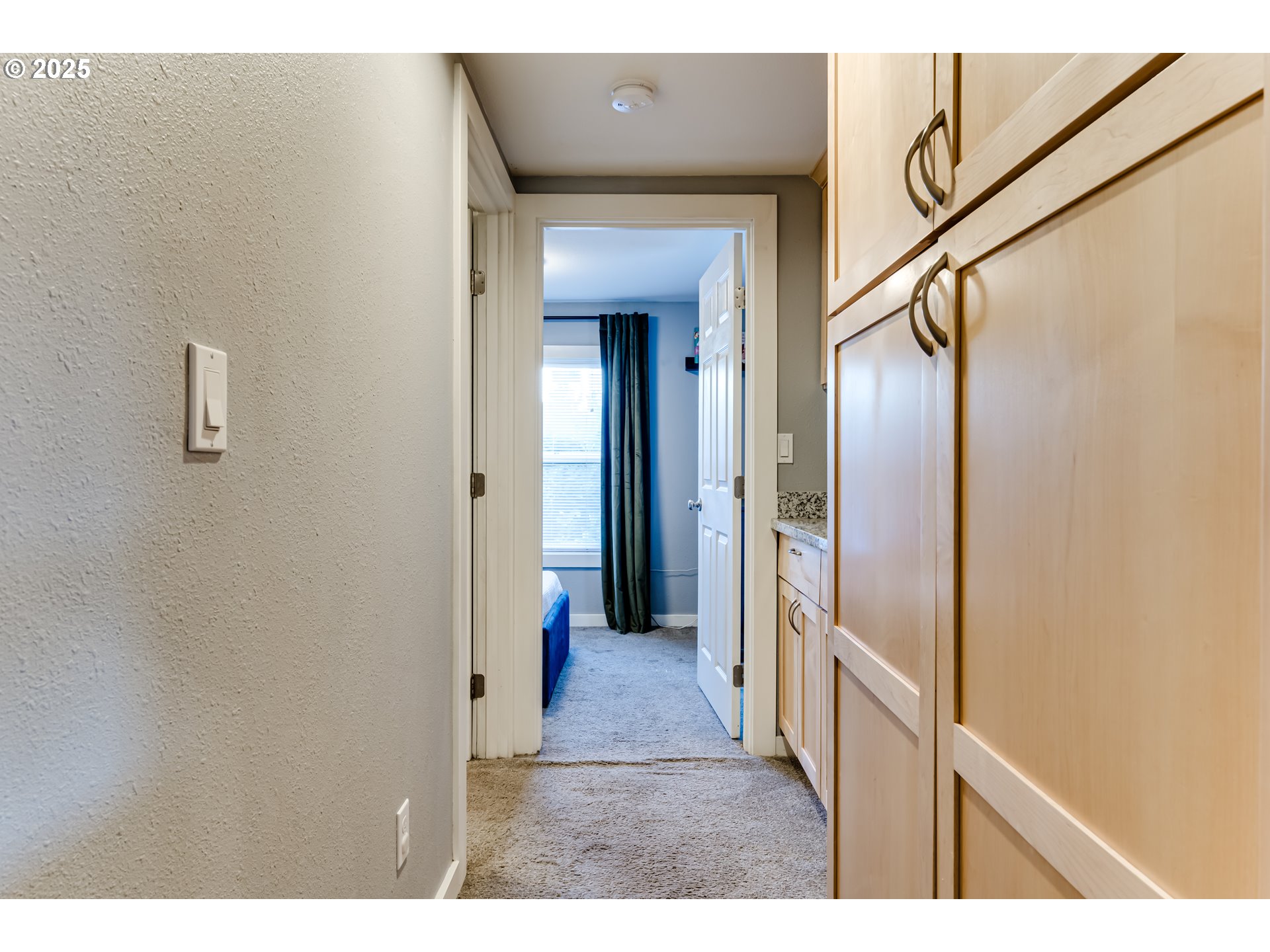 320 26th Street Springfield, OR 97477 - Photo 13 of 24 a view of a hallway with wooden floor
