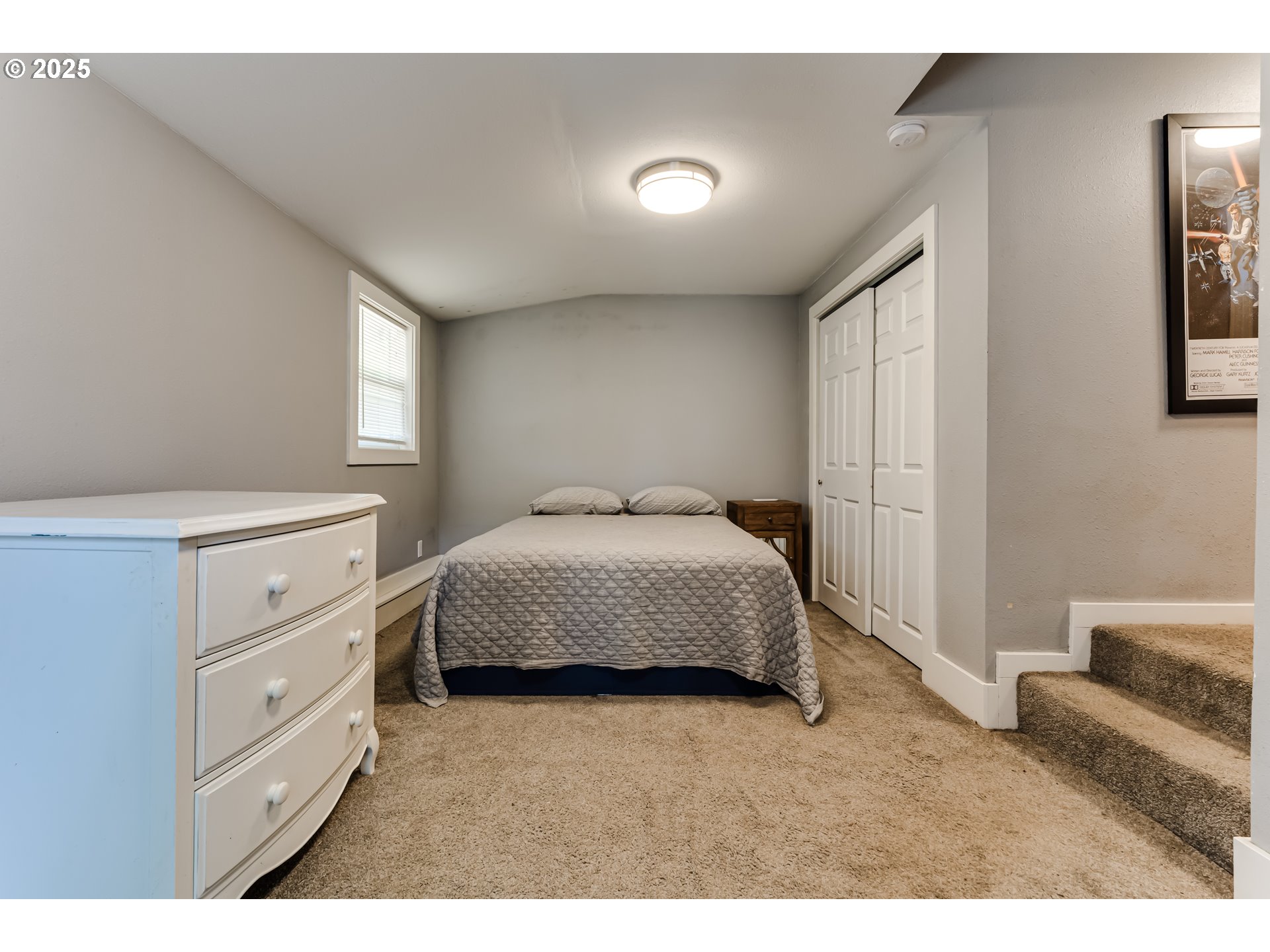320 26th Street Springfield, OR 97477 - Photo 19 of 24 a bedroom with a bed and a window