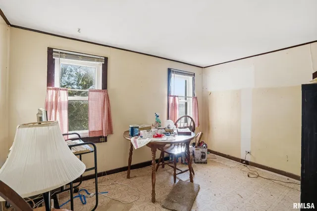 a kitchen with stainless steel appliances a stove a sink and a refrigerator