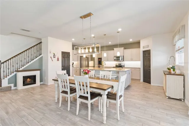 a spacious bedroom with a bed and a desk
