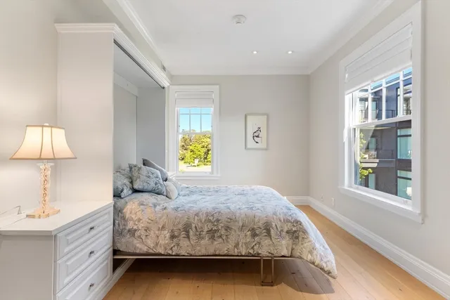 a bedroom with a bed and closet