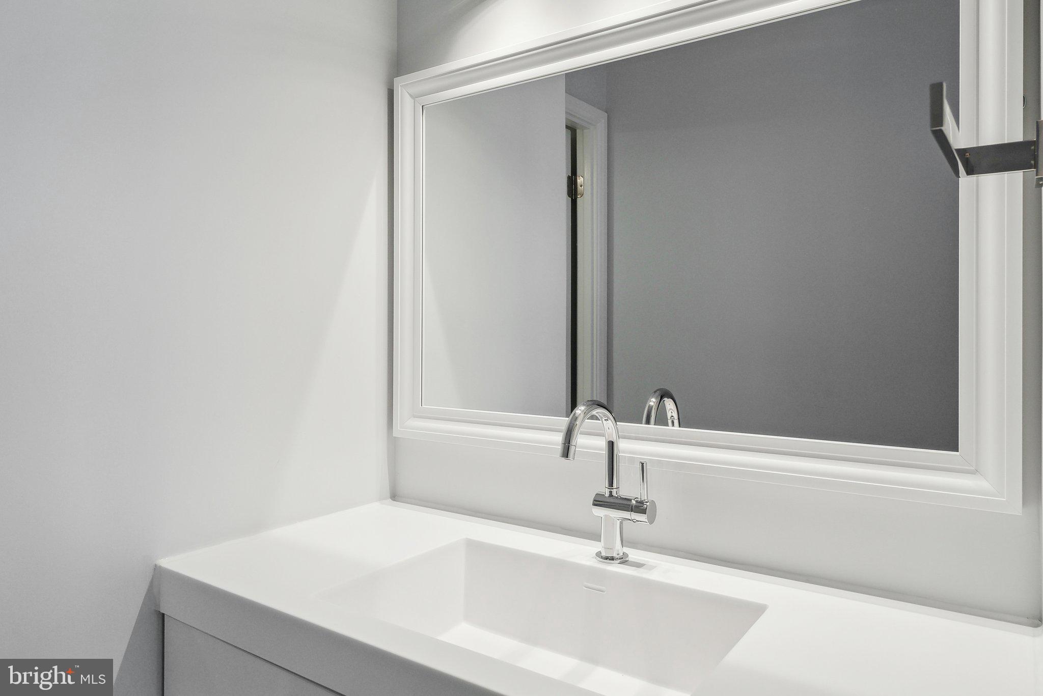 1077 30th Street Northwest, Unit 705 Washington, DC 20007 - Photo 22 of 31 a bathroom with a sink and a bathtub
