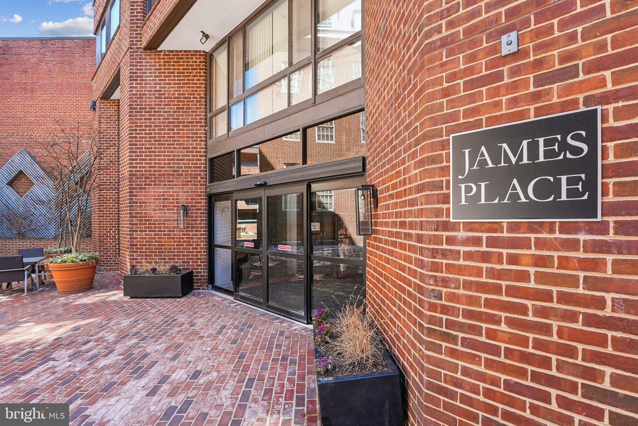1077 30th Street Northwest, Unit 705 Washington, DC 20007 - Photo 30 of 31 a view of a brick building with many windows