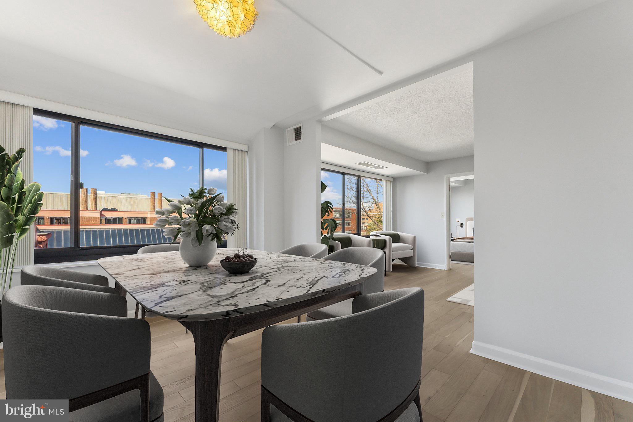 1077 30th Street Northwest, Unit 705 Washington, DC 20007 - Photo 5 of 31 a dining room with furniture and window