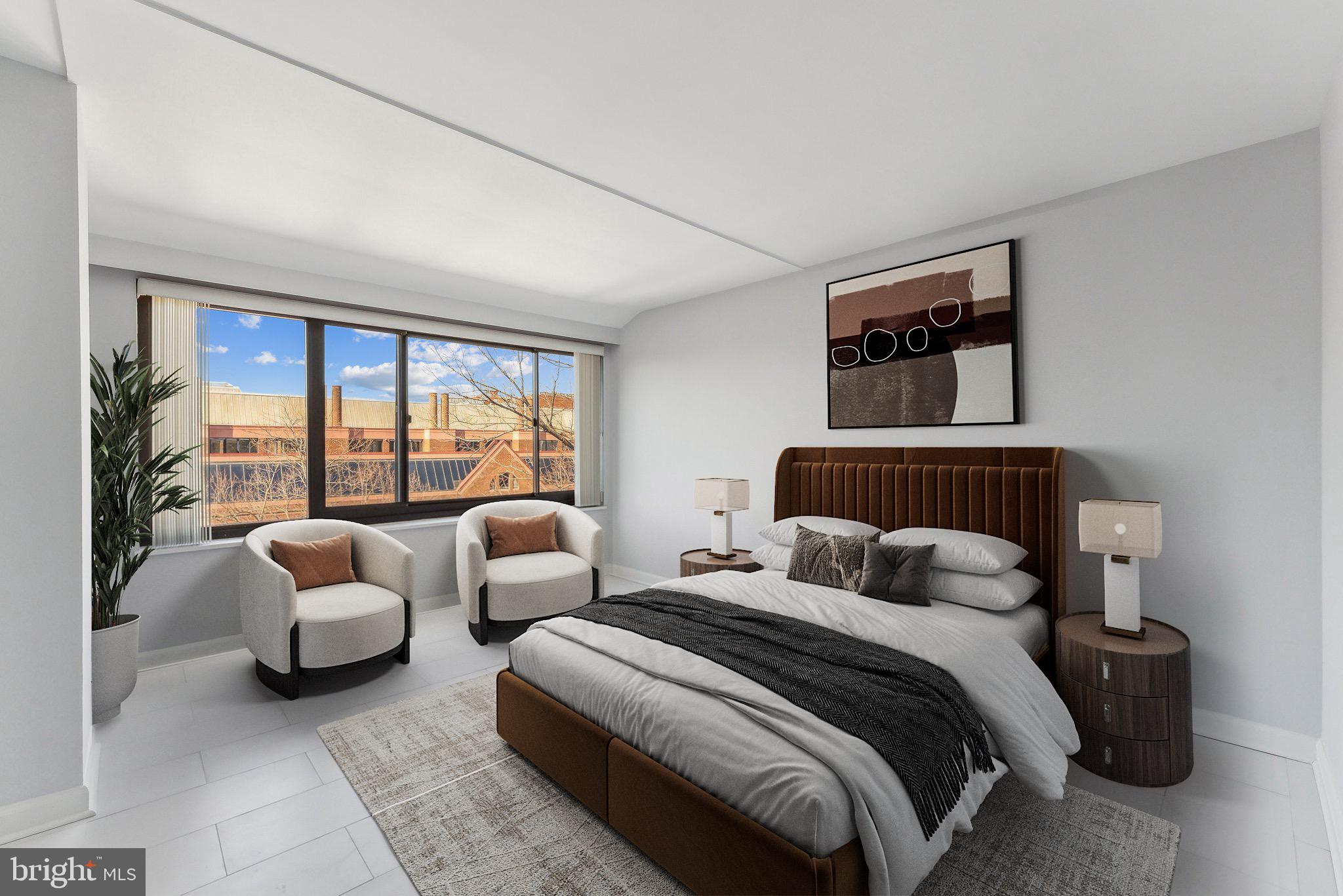 1077 30th Street Northwest, Unit 705 Washington, DC 20007 - Photo 8 of 31 a bedroom with a bed and glass window