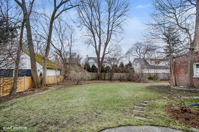 240 Raleigh Road Kenilworth, IL 60043 - Photo 2 of 9 a view of a yard with a house