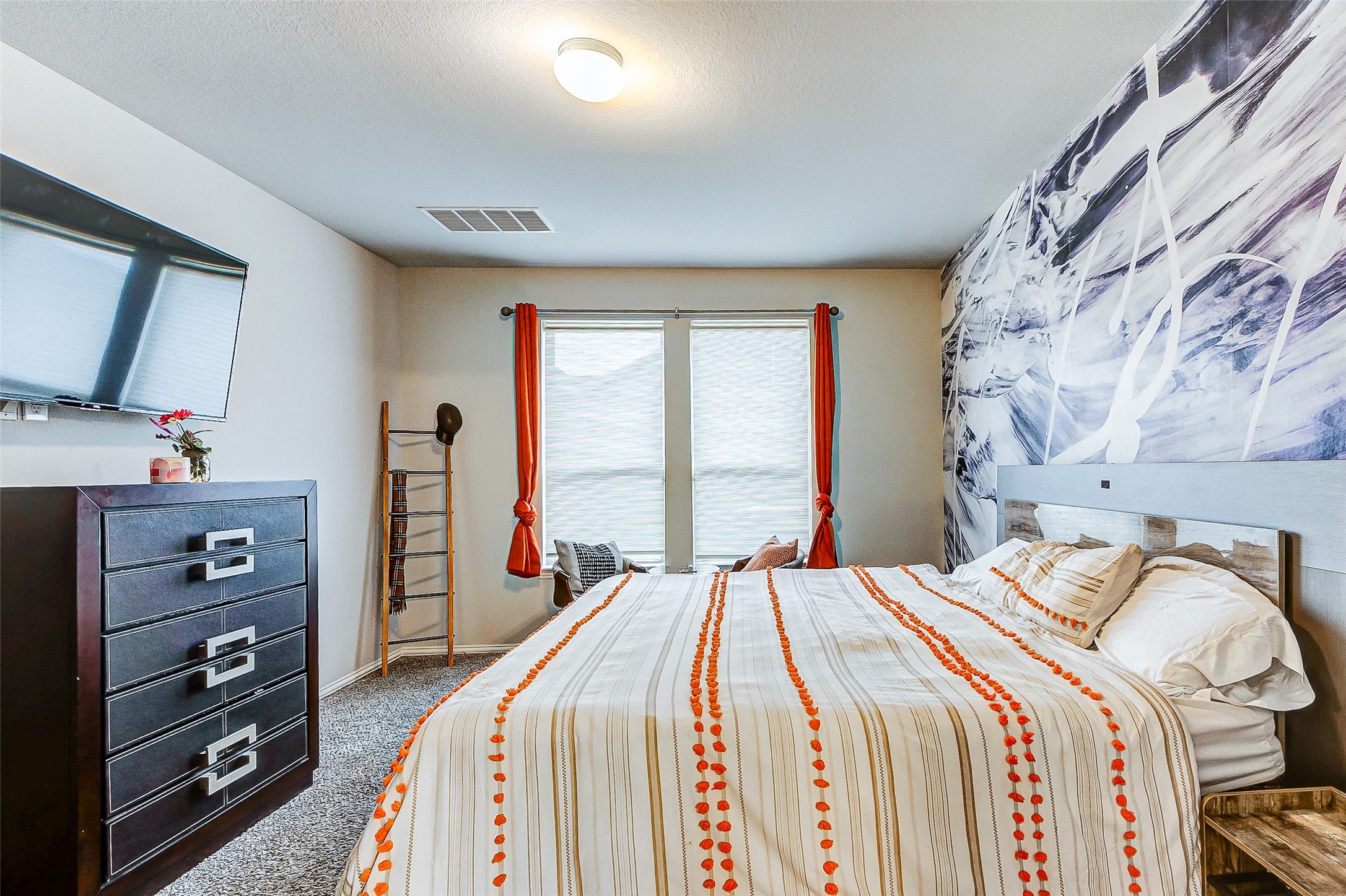 7314 Saddle Tree Drive Spring, TX 77379 - Photo 12 of 21 a bedroom with a bed and a dresser