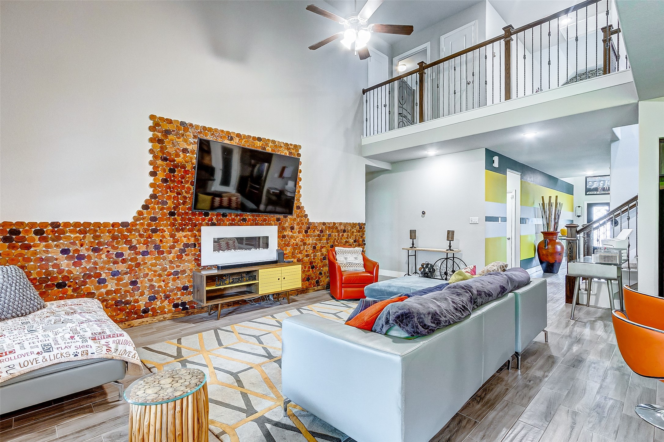 7314 Saddle Tree Drive Spring, TX 77379 - Photo 6 of 21 a living room with furniture and a flat screen tv