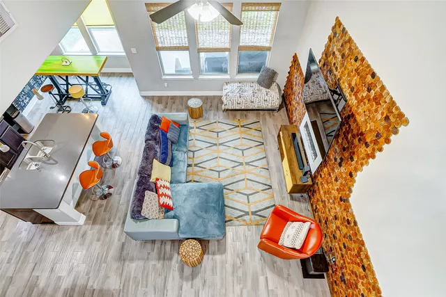 a bedroom with a bunk bed and a window