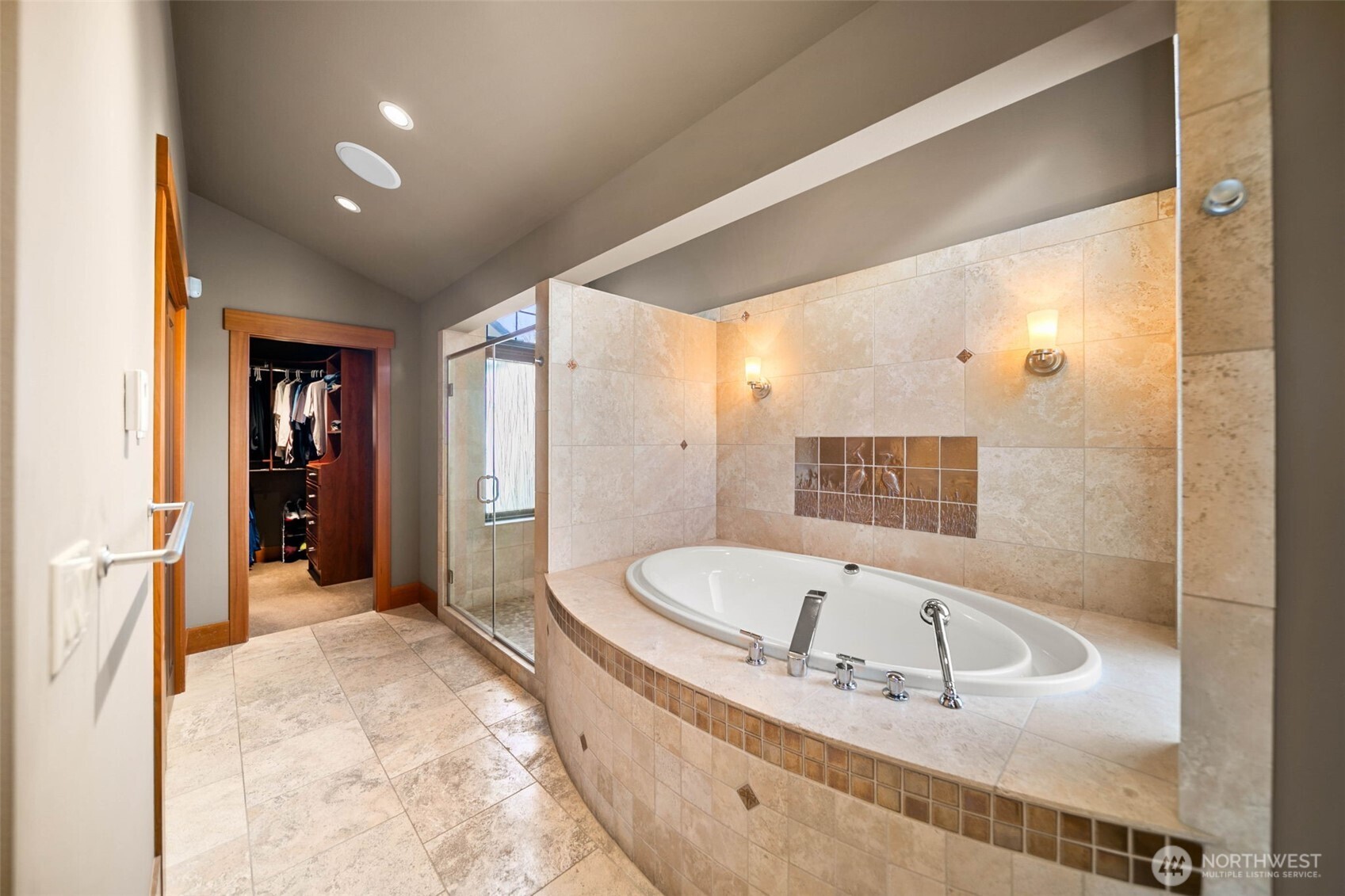 232 Crystal Drive Chelan, WA 98816 - Photo 17 of 39 a bathroom with a bathtub and a shower