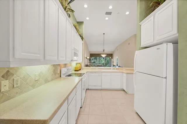 $325,000 | 7115 Boca Grove Place, Unit 204, Lakewood Ranch, FL 34202