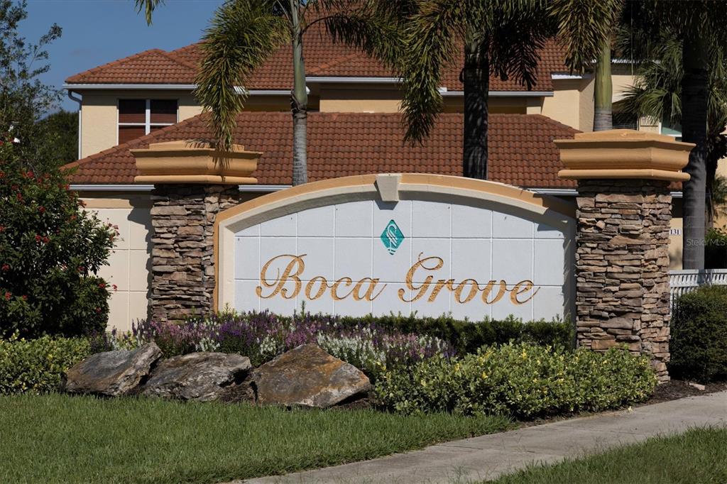 7115 Boca Grove Place, Unit 204 Lakewood Ranch, FL 34202 - Photo 29 of 40 a sign on the side of a building