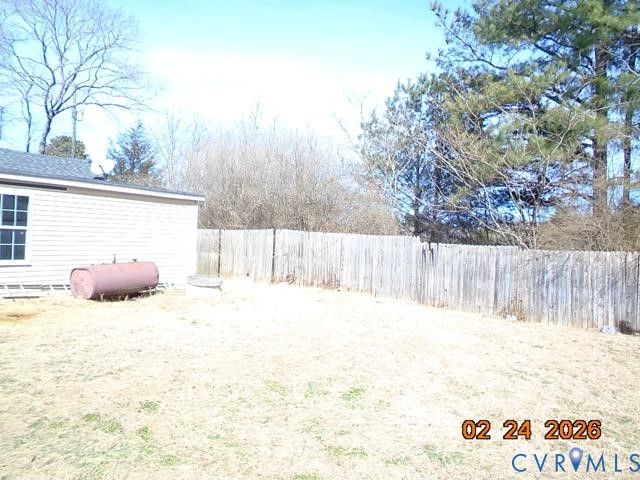 3034 Bradley Farm Road Tappahannock, VA 22560 - Photo 14 of 14 Fenced backyard with heating fuel