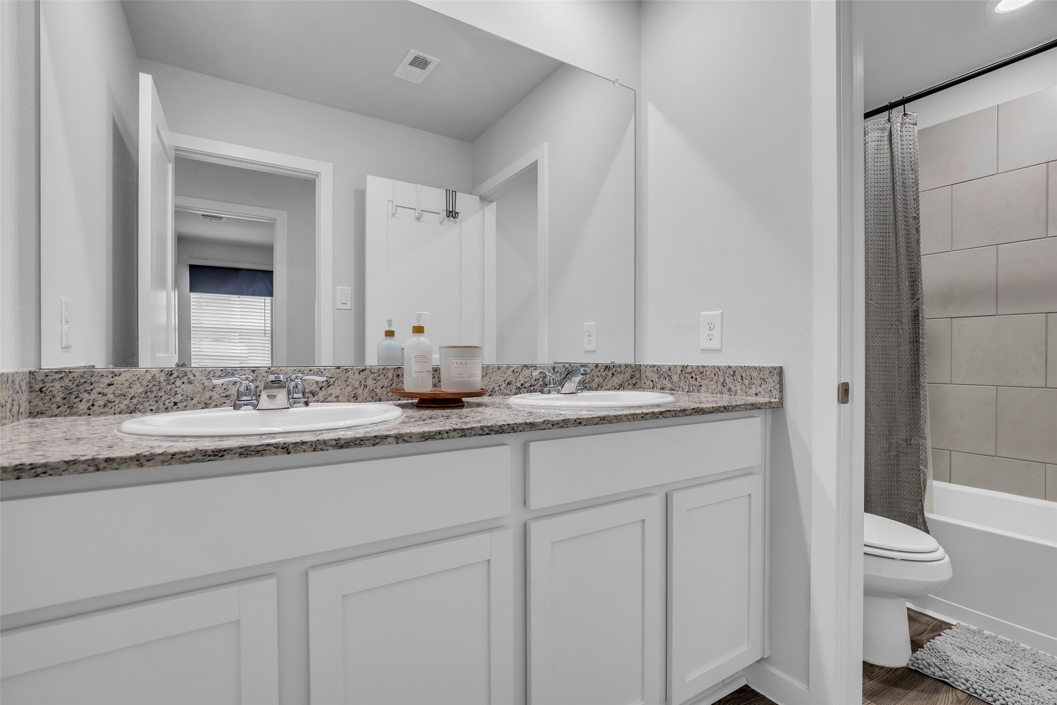 243 Intrepid Trail Magnolia, TX 77354 - Photo 14 of 17 3rd Bathroom with double sink, private 3rd Bathroom bathtub/shower and toilet on the 2nd floor