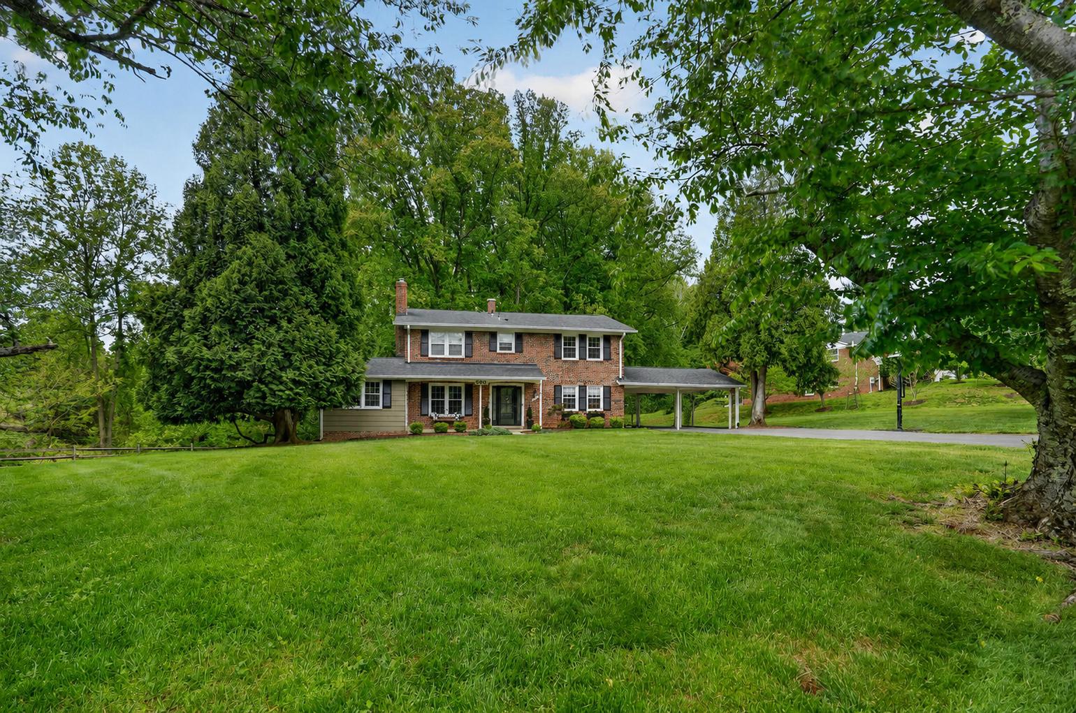 500 Finsbury Road Silver Spring, MD 20904 - Photo 2 of 54 a house view with a sitting space and garden