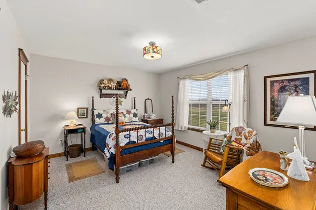 a bathroom with a sink vanity and a mirror