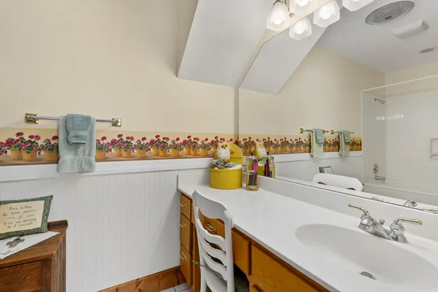 a view of balcony with wooden floor