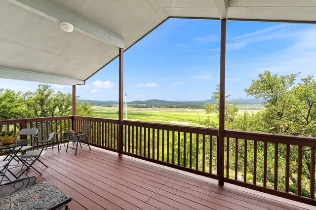 a kitchen with a refrigerator and a sink