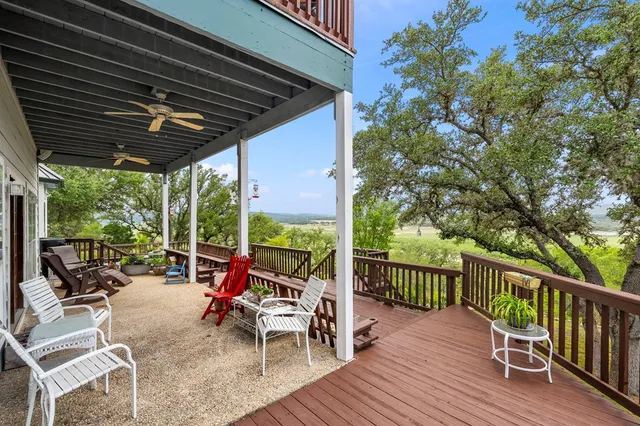 a view of a chairs on the deck