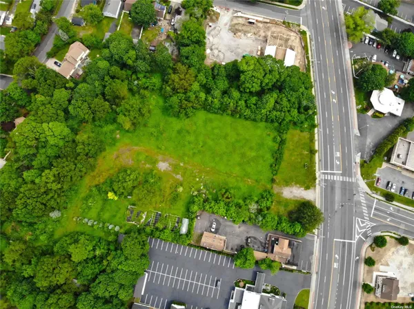 a view of a yard from a balcony