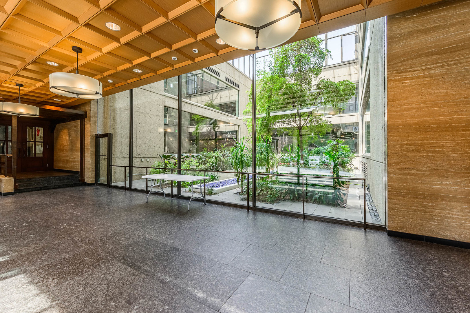 1030 North State Street, Unit 29M Chicago, IL 60610 - Photo 11 of 11 a view of an empty room with a balcony