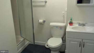 11504 Goodloe Road Silver Spring, MD 20906 - Photo 5 of 7 a bathroom with a sink and a toilet