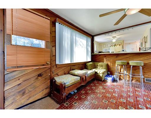 162 Mallowhill Road Springfield, MA 01129 - Photo 7 of 34 a living room filled with furniture hardwood floor and a large window