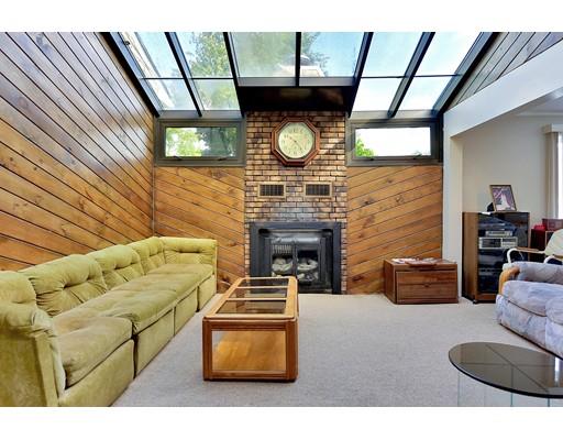 162 Mallowhill Road Springfield, MA 01129 - Photo 8 of 34 a living room with furniture a fireplace and a large window