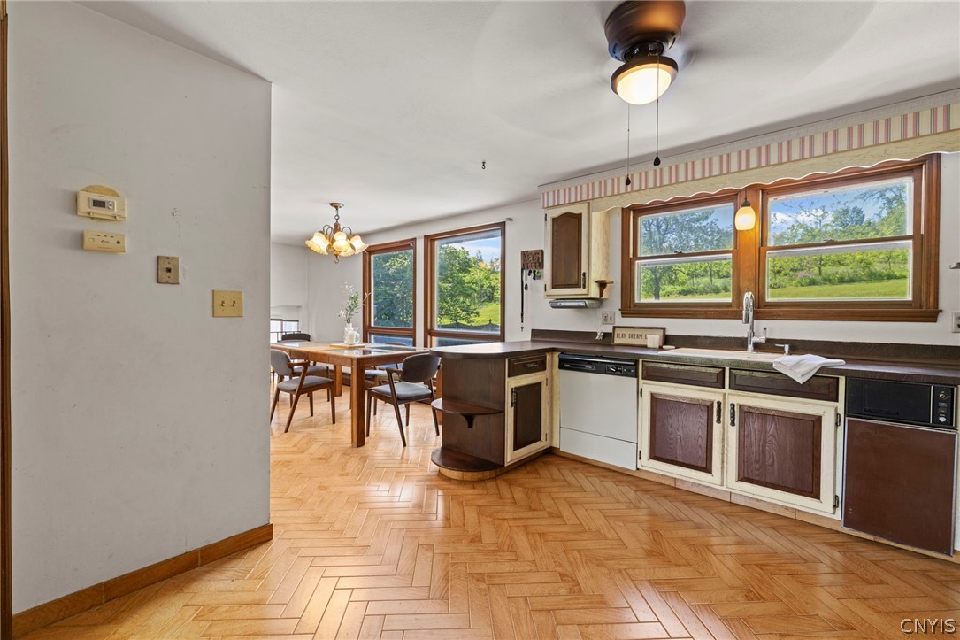 2170 Bitters Road Camillus, NY 13031 - Photo 11 of 47 Original hardwood flooring with original cabinetry