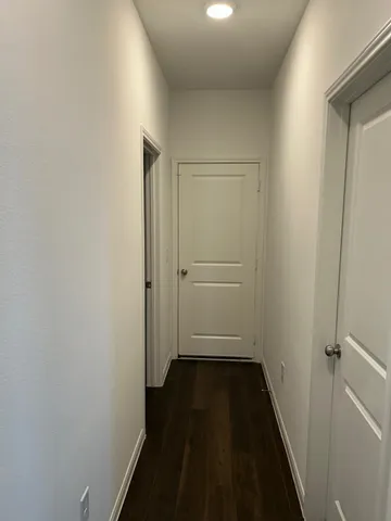 a view of small space with wooden floor