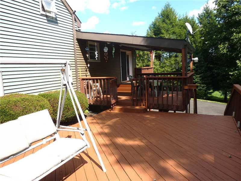 412 Denny Road Valencia, PA 16059 - Photo 19 of 25 Patio/Deck. Many peaceful evenings will be enjoyed on either the open part of the deck or the covered area.