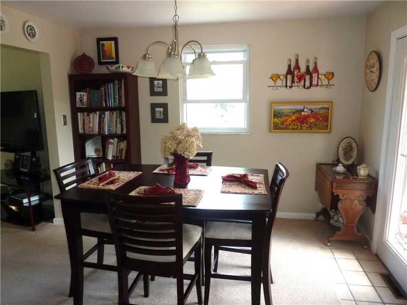 412 Denny Road Valencia, PA 16059 - Photo 10 of 25 Dining Room. The dining room opens to the living room for ease of entertaining. Lots of natural light flows into this space.