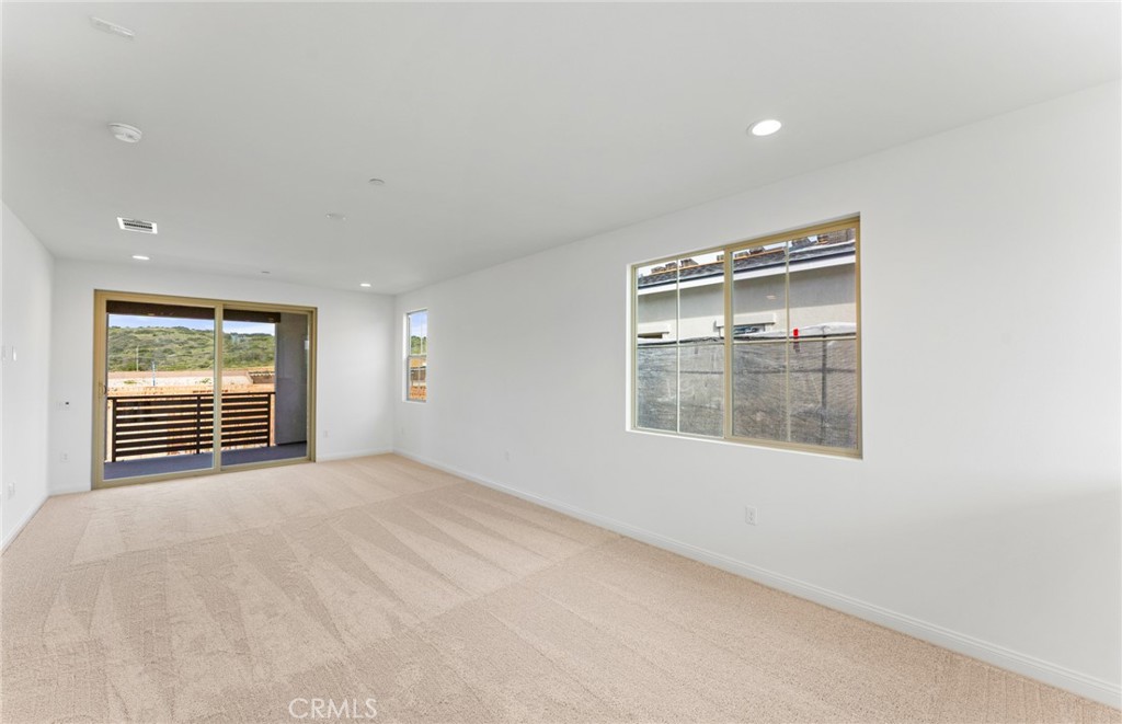 743 Corkscrew Road Rancho Mission Viejo, CA 92694 - Photo 26 of 35 a view of an empty room with a window