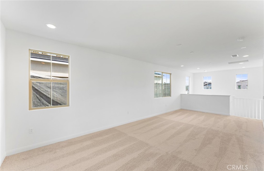743 Corkscrew Road Rancho Mission Viejo, CA 92694 - Photo 27 of 35 an empty room with windows