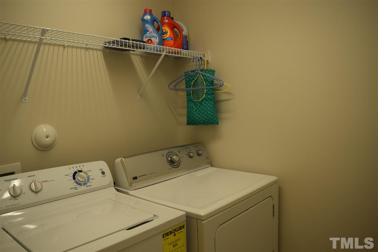 8702 Redcrest Place Raleigh, NC 27617 - Photo 12 of 22 a utility room with dryer and washer