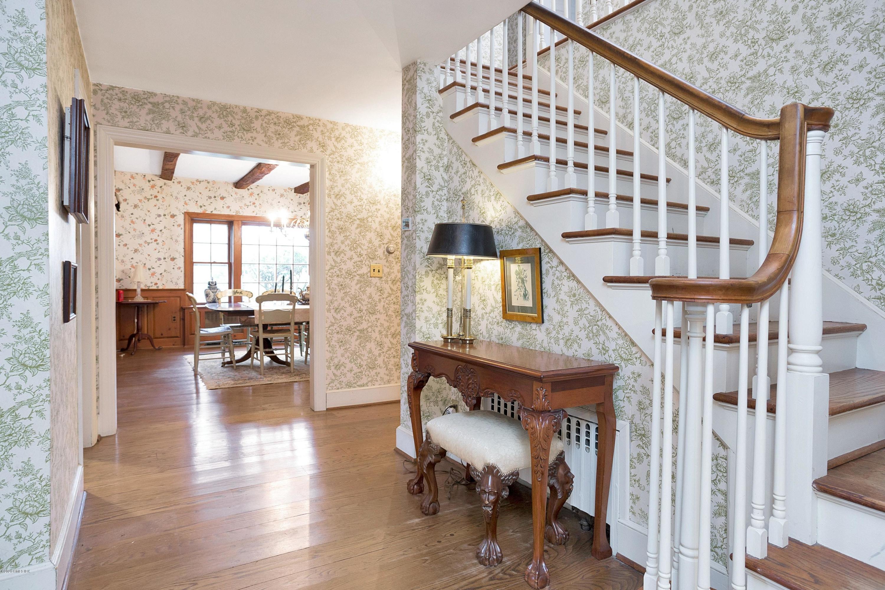 207 Round Hill Road Greenwich, CT 06831 - Photo 5 of 28 a view of entryway livingroom and hall with wooden floor