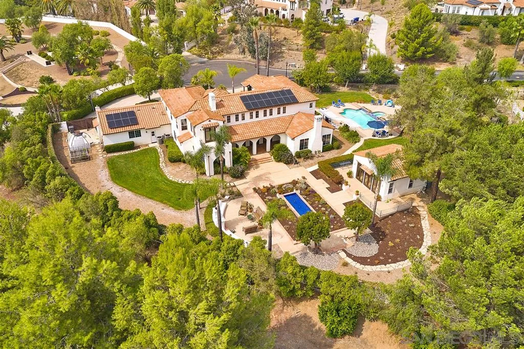 13625 Ash Hollow Crossing Road Poway, CA 92064 - Photo 25 of 25 a picture of street view with residential house and parking space