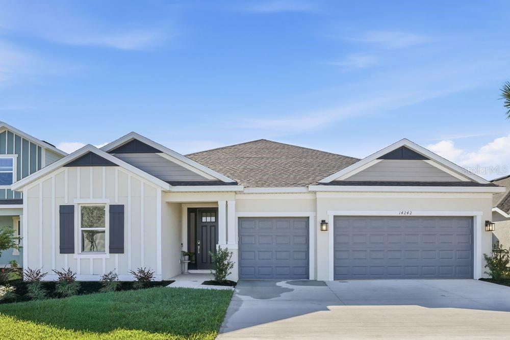 front view of a house with a yard