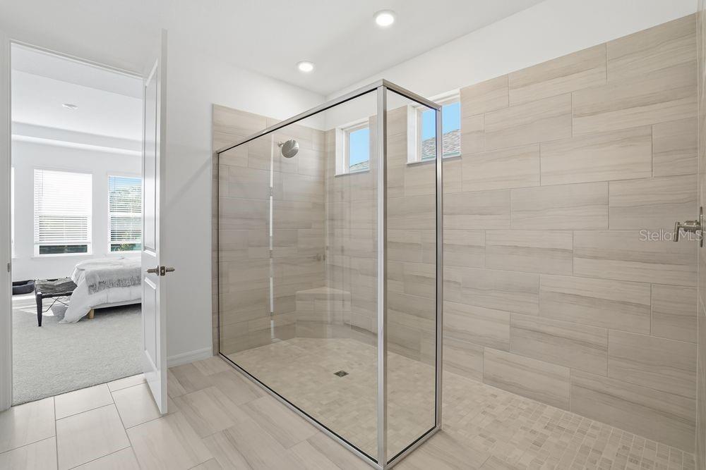 14242 Sawmill Street Parrish, FL 34219 - Photo 16 of 41 a bathroom with a shower