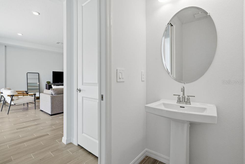 14242 Sawmill Street Parrish, FL 34219 - Photo 24 of 41 a bathroom with a sink and a mirror