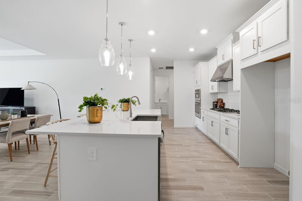 14242 Sawmill Street Parrish, FL 34219 - Photo 5 of 41 a large kitchen with granite countertop lots of counter top space
