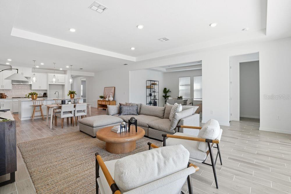 14242 Sawmill Street Parrish, FL 34219 - Photo 10 of 41 a living room with furniture and wooden floor