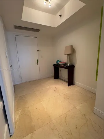a view of kitchen with stainless steel appliances granite countertop sink stove refrigerator and cabinets