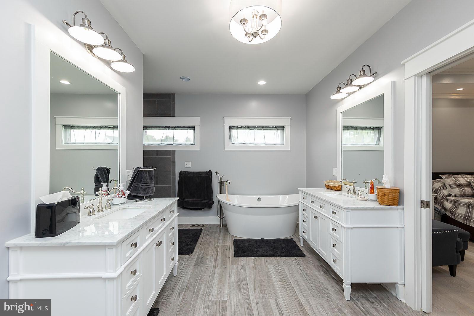 158 Riding Chapel Road Stephens City, VA 22655 - Photo 23 of 54 Primary bath w/ double vanities & water closet