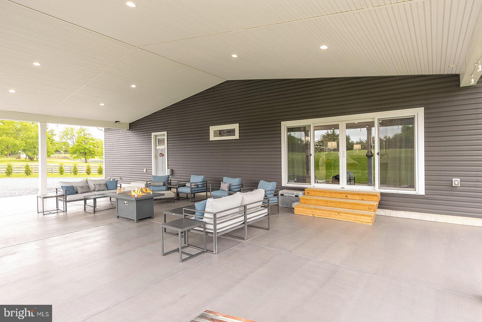 158 Riding Chapel Road Stephens City, VA 22655 - Photo 43 of 54 Enjoy this 24'x46' outdoor space rain or shine!