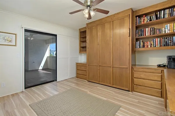 a view of a livingroom with a bookshelf