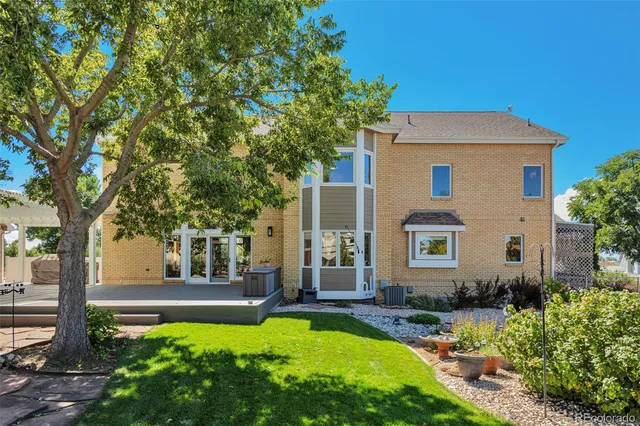 a front view of a house with swimming pool