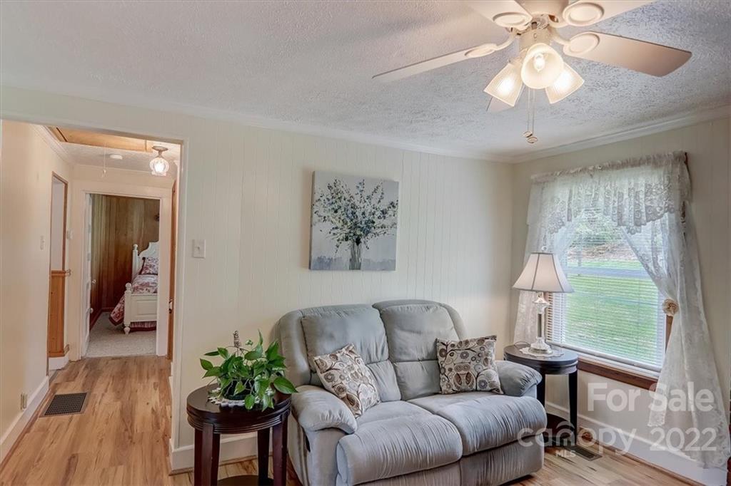 115 Substation Road Canton, NC 28716 - Photo 13 of 41 a living room with furniture and a large window